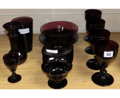 A group of 19th and early 20th century amethyst coloured glass tallest 18cm