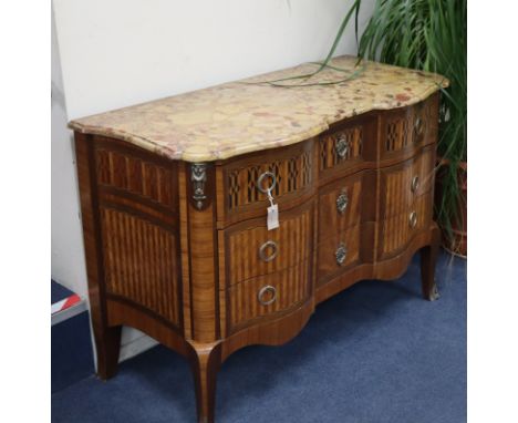 A French transitional style marble top bombe commode W.128cm