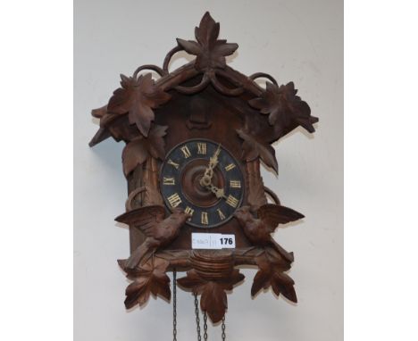 A Black Forest carved cuckoo clock