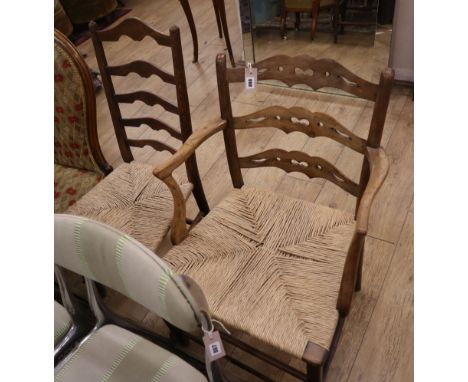 A 19th century provincial beech elbow chair and a ladder back chair