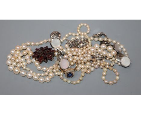 Three assorted cultured pearl necklaces, a Victorian yellow metal and garnet brooch, a 9ct ring and assorted white metal cuff