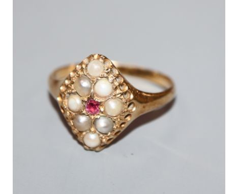 A George V 18ct gold, split pearl and ruby set cluster marquise shaped dress ring, size M.