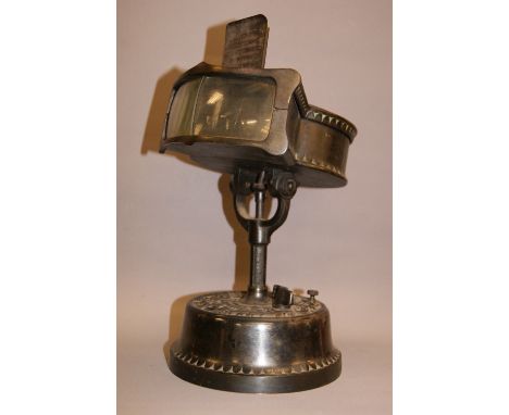 British Mutoscope & Biograph Company London, a clockwork operated Kinora viewer (model 11), the cast metal body with hinged t