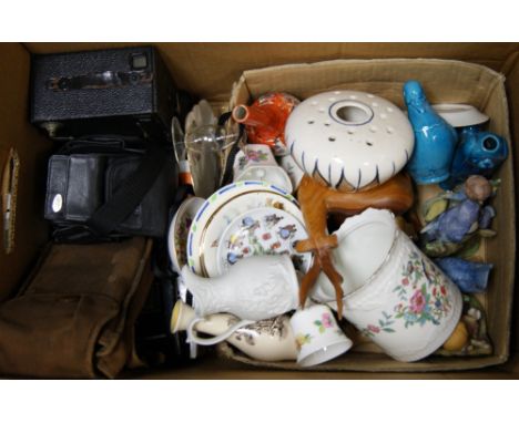 A quantity of various collectibles including Poole pottery and cameras etc. 