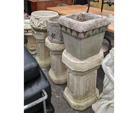 ARCHITECTURAL GARDEN PEDESTALS, a set of three, 100cm at tallest, each with differing planter, composite stone. (6) 