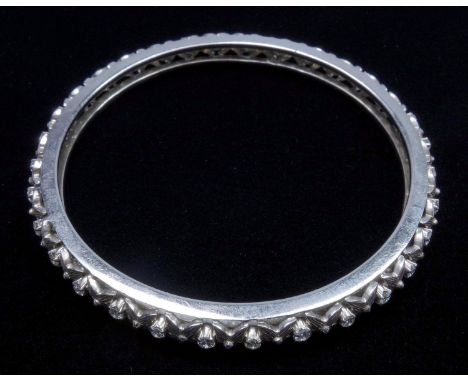 A diamond set fixed bangle, set with 32 round brilliant cut diamonds, weighing an estimated total of 1.60 ct, each diamond is