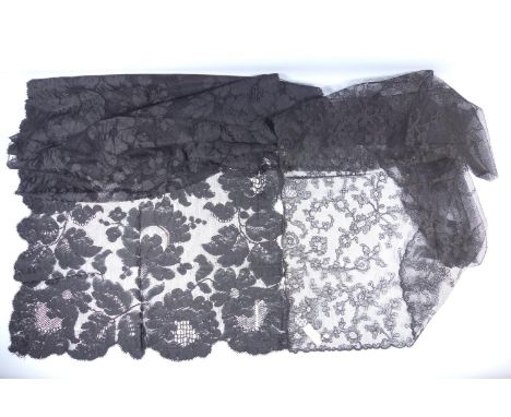 French black silk lace stole with large scale design of flowers and scalloped edge, C. 1900, 43 x 220 cm and a net lace headp