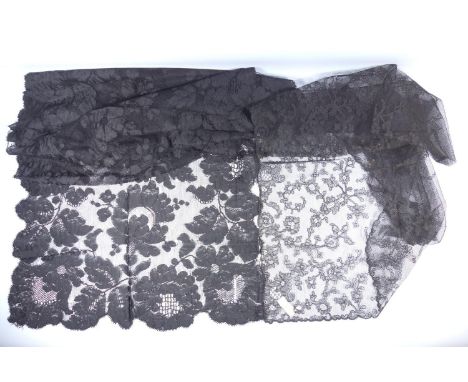 French black silk lace stole with large scale design of flowers and scalloped edge, C. 1900, 43 x 220 cm and a net lace headp