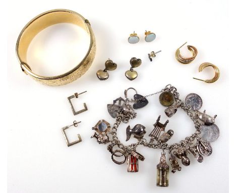 Mixed group of jewellery; opal stud earrings in 9ct gold mounts, a silver charm bracelet and earrings, unmarked yellow metal 