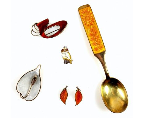 A pair of Danish enamel silver leaf earrings, Norwegian white enamel brooch, enamel owl, a red brooch and an Anton Michelsen 