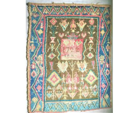 An early Finnish folk art Ryijy rug tapestry dated 1722. Tree of Life design with figures, flowers plants and double headed e