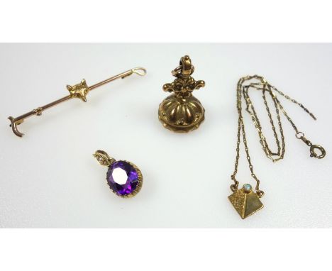 Edwardian amethyst set pendant, a fob with glass intaglio depicting Victoria, a pendant with small opal and a fox and crop br
