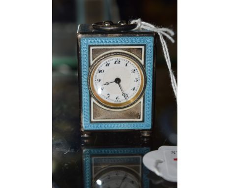 A silver and guilloche enamel miniature carriage timepiece, believed to be by Tiffany, import marks for London 1919, stamped 