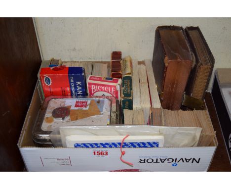 A quantity of vintage playing cards, and other items. 