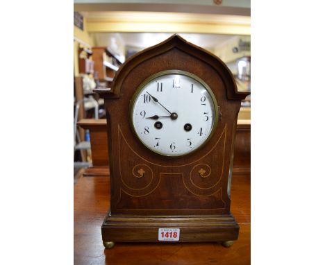 An Edwardian mahogany and line inlaid mantel clock, 31cm high. 
