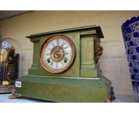 An Ansonia green painted metal mantel clock, 39cm wide. 