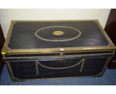 An antique green leather and brass studded camphor trunk, 49cm high x 107cm wide x 53cm deep. 
