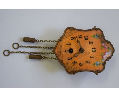 A vintage miniature wall timepiece, with painted enamel dial, 7.5cm high. 
