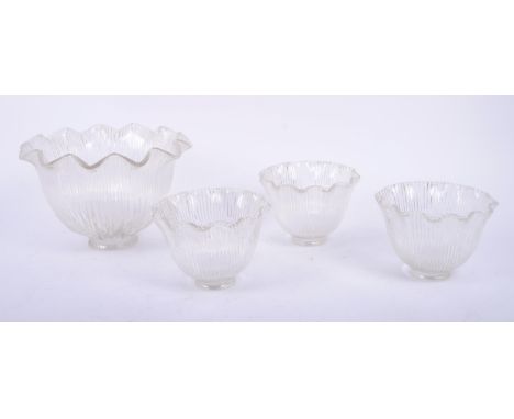 Four antique early 20th century Edwardian holophane glass light shades, all with frilled edges. Apt for repurposing / upcycli