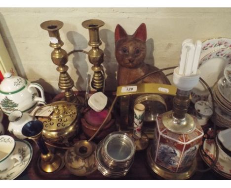 A Tray of Sundries to Include Pair of Brass Candle Sticks, Carved Wooden Cat Ornament, Mantle Clock, Silver and Glass Coaster