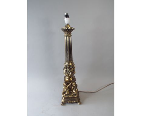 A Cast Brass Column Table Lamp with Cherub Figures to Base.