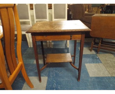 An Oak Side Table with Single Drawer and Stretcher Shelf.