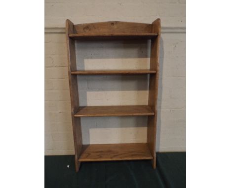 An Oak Four Shelf Open Bookcase.