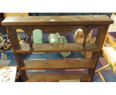 A Stained Pine Wall Shelf. 