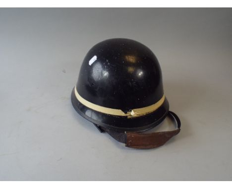 A Protective Helmet by Cromwell, London