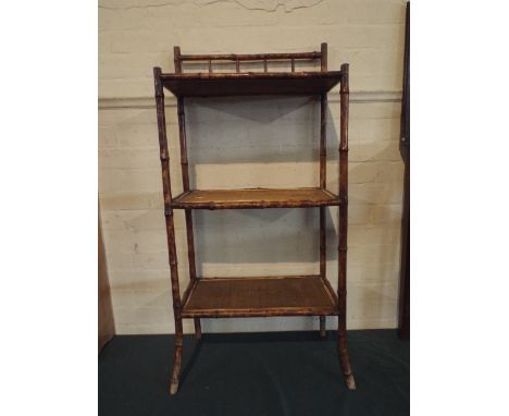 A Bamboo Three Tier Shelf with Raised Gallery.