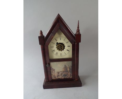 An American Mantle Clock by The Waterbury Clock Company.