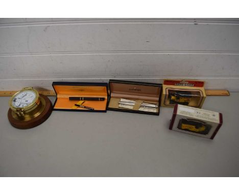 BRASS MOUNTED WALL CLOCK, A SCHAEFFER STERLING SILVER FOUNTAIN PEN, A WATERMAN FOUNTAIN PEN AND TWO BOXED TOY CARS