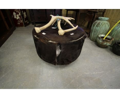 Cow hide pouffe