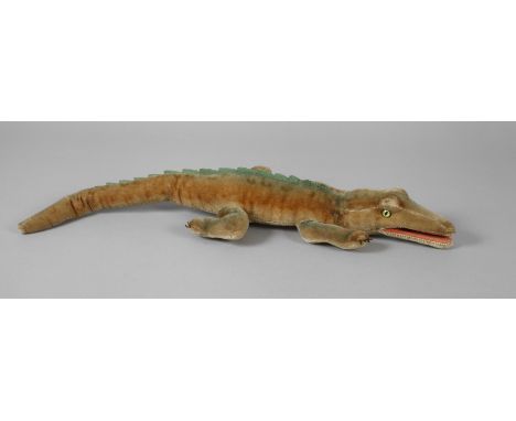 Steiff Krokodil "Gaty"um 1960, ungemarkt, gelb-grün-brauner Mohair hart holzwollegestopft, als liegendes ungegliedertes Kroko