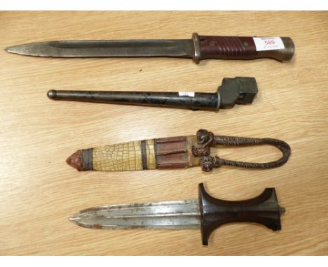 A WWII bayonet (no scabbard); a stiletto bayonet; a dagger with wooden handle and snakeskin sheath