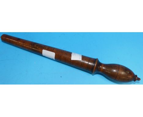 A 19th century turned wood ring sizer