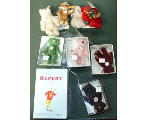 A Steiff originally boxed Rupert Bear; 4 originally boxed coloured miniature teddies; 4 similar unboxed, one with certificate