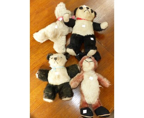 Two mid-20th century Chiltern Pandas, 14½" & 11", a Goofy dog with label, 14"; a reclining bear, 11½"