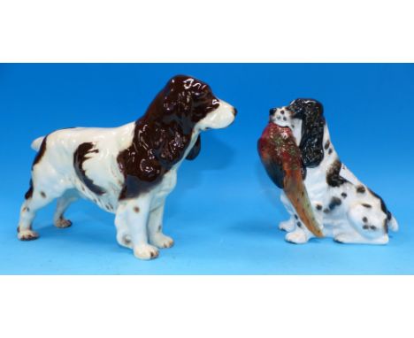 A Royal Doulton Spaniel, HN 1138; a Goebel Spaniel