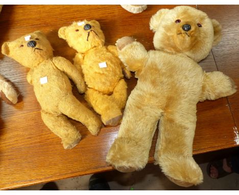 A large mid-20th century Chiltern teddy with plastic nose and amber eyes, with label, 19"; 2 similar early/mid-20th century b