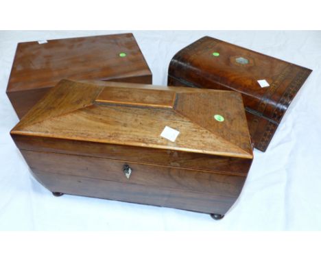 An early 19th century sarcophagus shaped tea caddy; a jewellery box and a cigar box