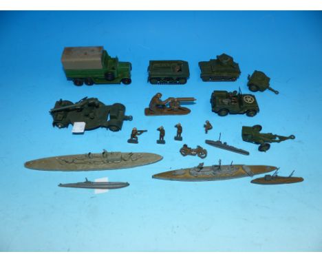A selection of inky Army vehicles including tanks, jeep, guns, men and ships (all with some loss to paint)