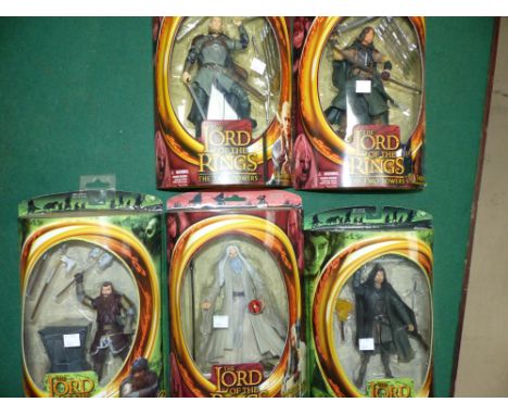 Five Lord of the Rings figures:  Legolas; Gimli; Strider; Faramir & Saruman