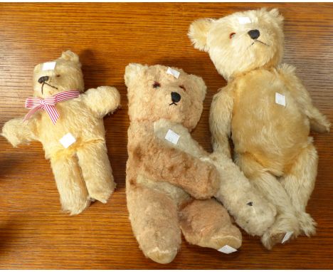 A Chiltern musical teddy with amber eyes, and baby, 10"; 2 other Chiltern teddies, 14" & 10"