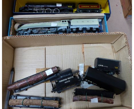 A replica LNER Silver Line, 4-6-2, cream matt, 2509, boxed, EDL1; a replica Canadian Pacific set engine and 6 items, black