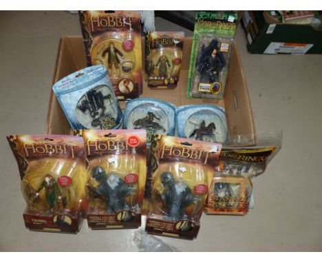 Nine small Lord of the Rings figures