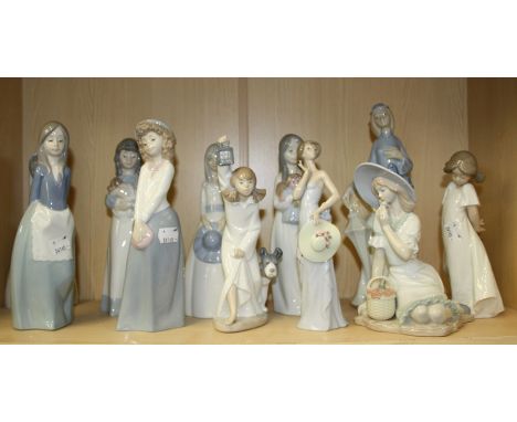 A Lladro figure of a young lady wearing a strapless gown holding a wide brimmed hat, together with ten Nao and other similar 