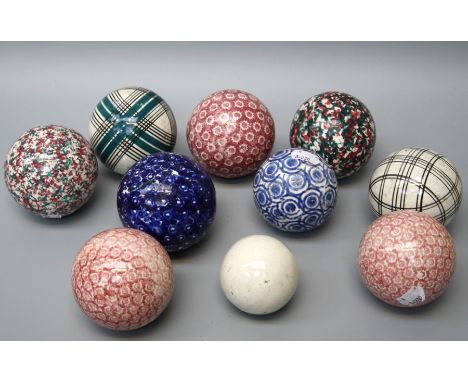 A collection of nine early 19th century Scottish terracotta&nbsp; carpet bowls, cross hatch, sponged and circle printed decor