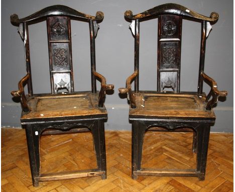 A pair of 19th century Chinese elm 'Official's Hat' armchairs. 54.5 cms (top of seat).