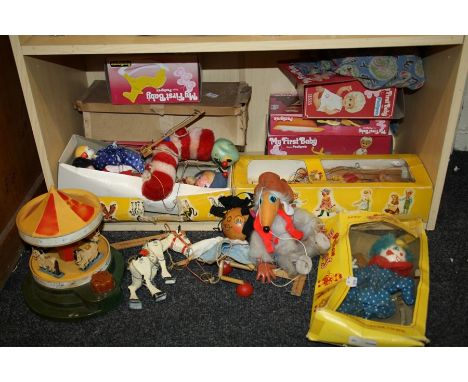 A collection of Pelham puppets, Rupert Bear, Womble, Clown,Caterpilla, Heidi. Together with other vintage toys including a Co